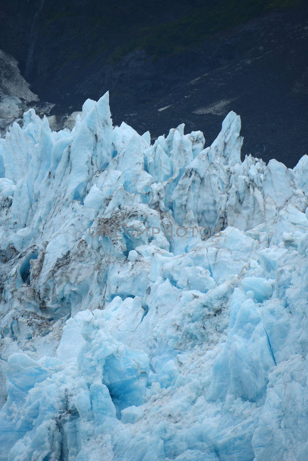 blue color of tidewater glacier in prince william sound in alaska