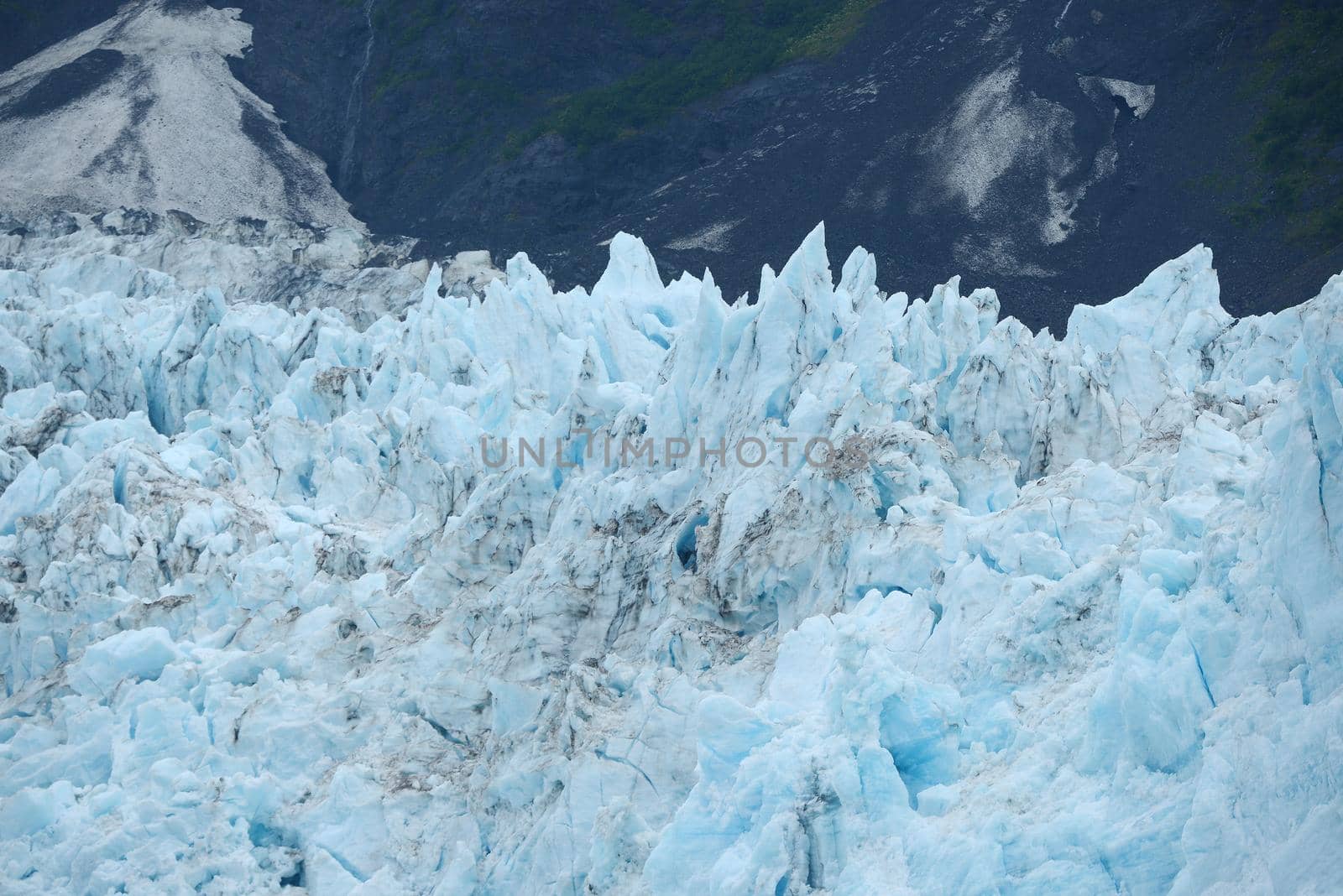 blue color of tidewater glacier in prince william sound in alaska