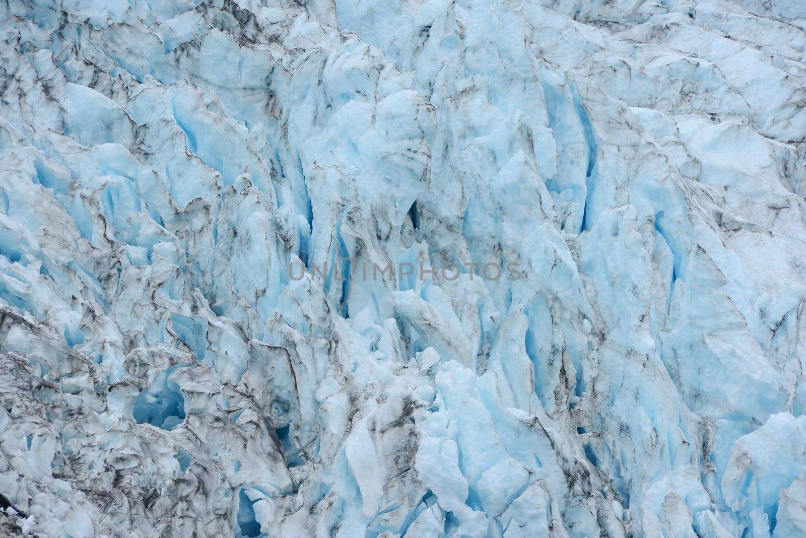 blue color of tidewater glacier in prince william sound in alaska