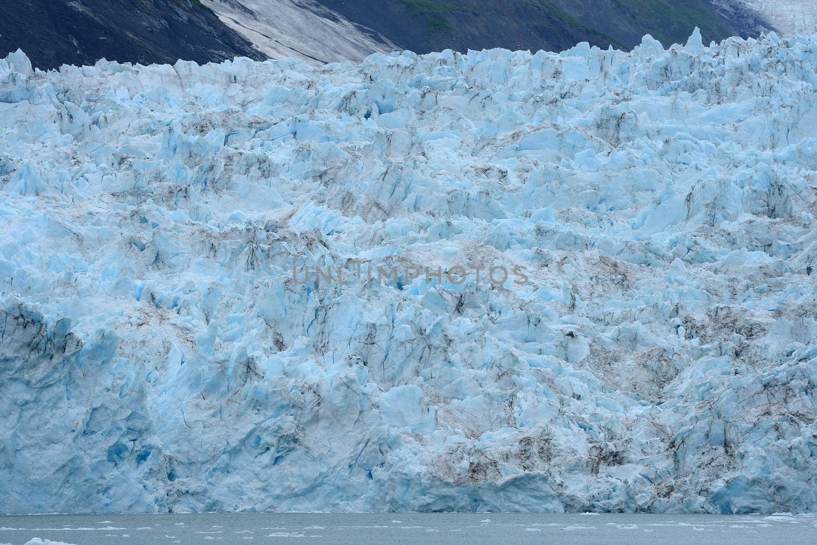 blue color of tidewater glacier in prince william sound in alaska