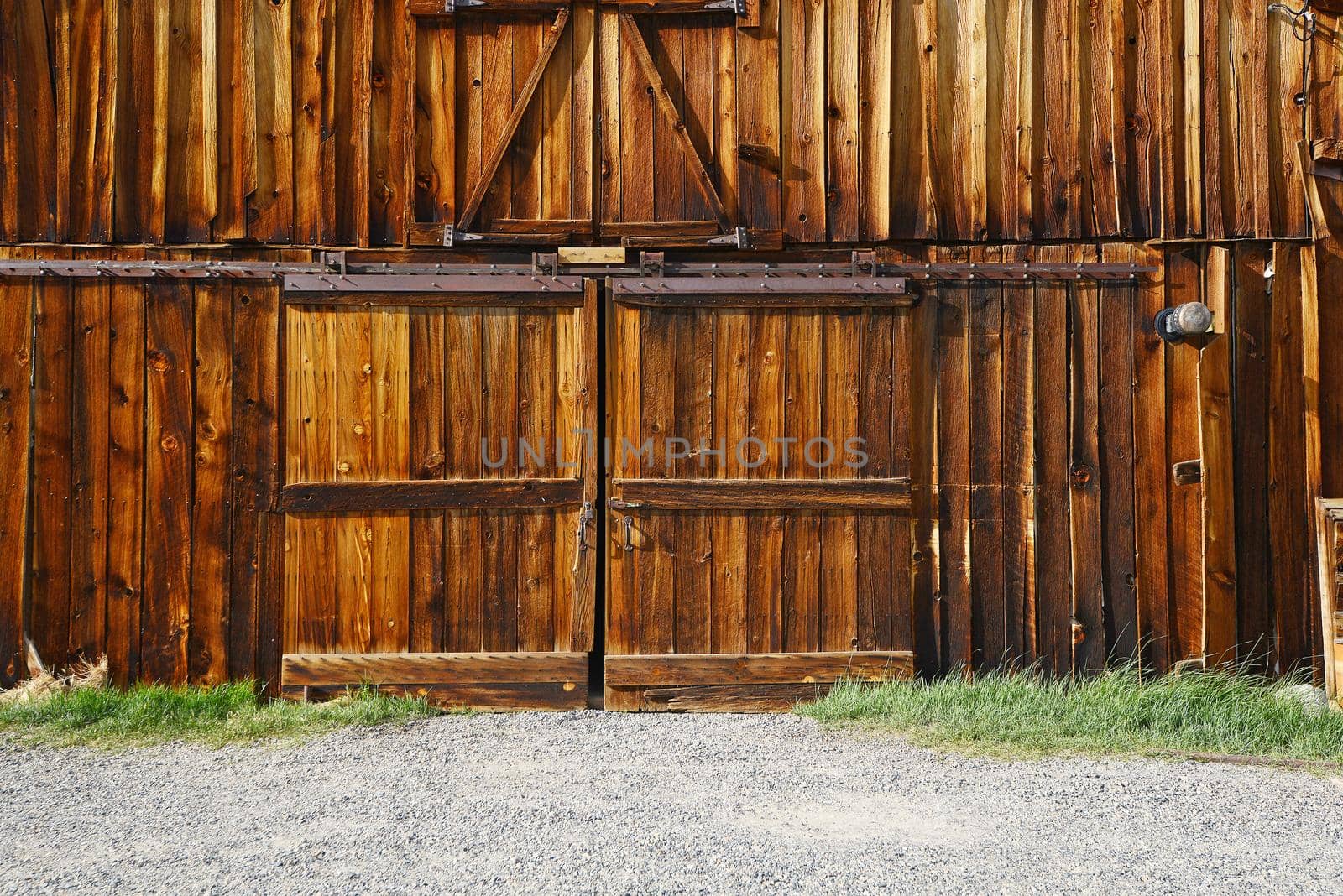 a wooden wall in Bodie historic state park of a ghost town from a gold rush era in Sierra Nevada