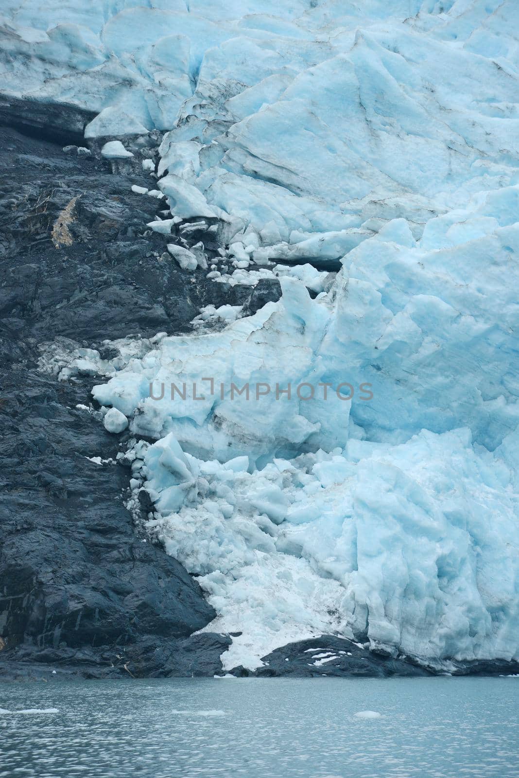 blue ice of portage glacier in alaska
