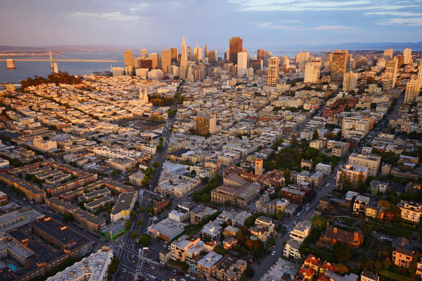 an aerial view of downtown san francisco during sunset