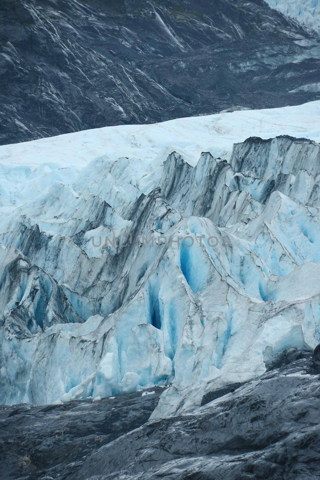 blue ice of portage glacier in alaska
