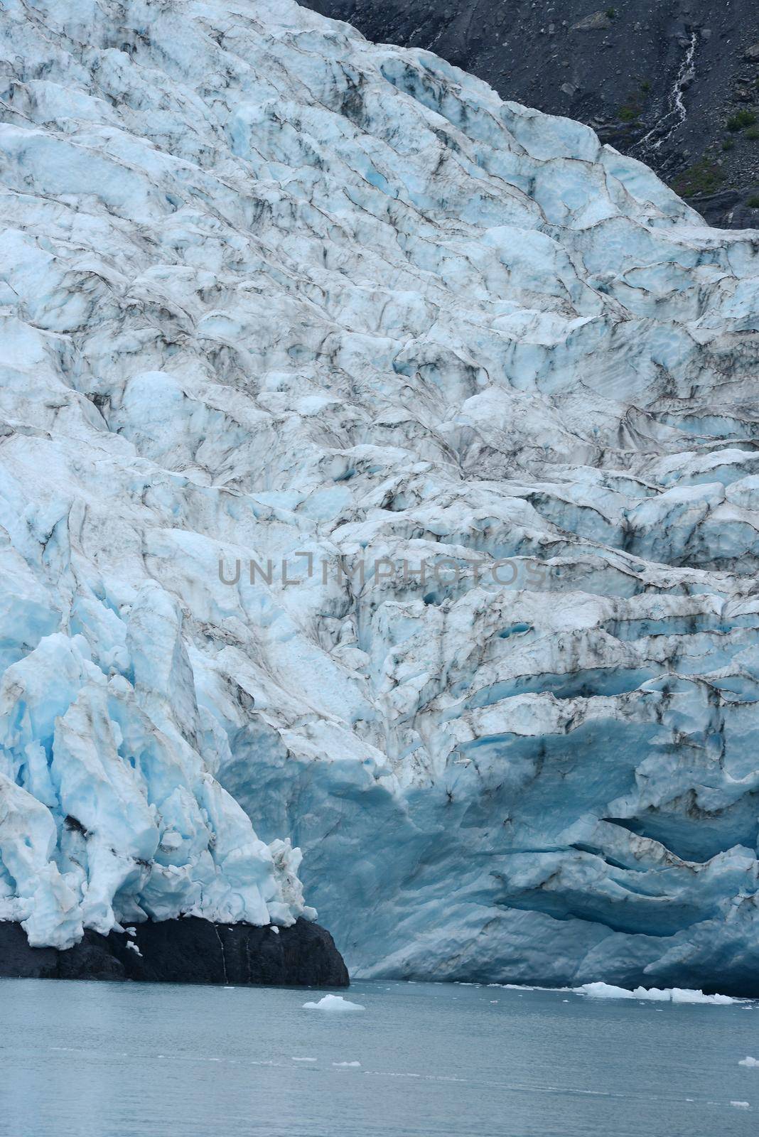 blue color of tidewater glacier in prince william sound in alaska