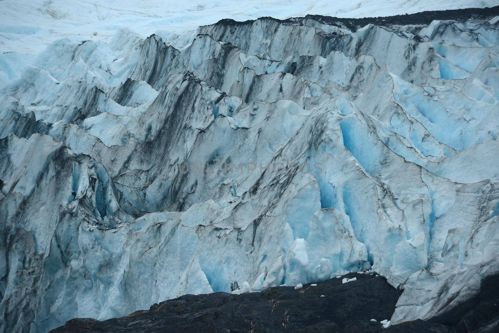 blue ice of portage glacier in alaska
