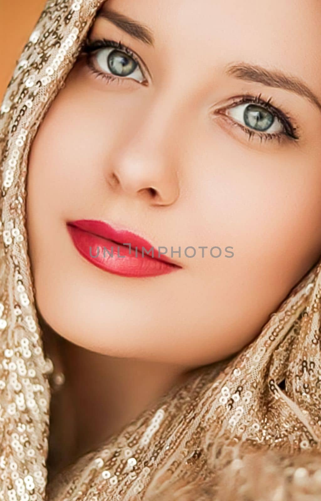 Beauty, luxury fashion and glamour, woman dressed in gold, portrait