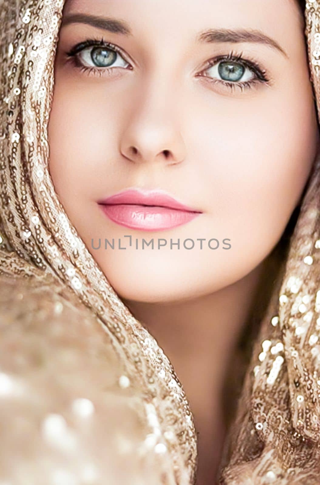 Beauty, luxury fashion and glamour, woman dressed in gold by Anneleven