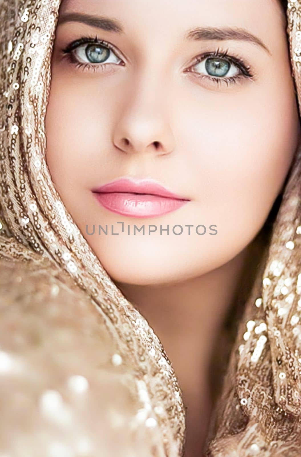 Beauty, luxury fashion and glamour, woman dressed in gold, portrait