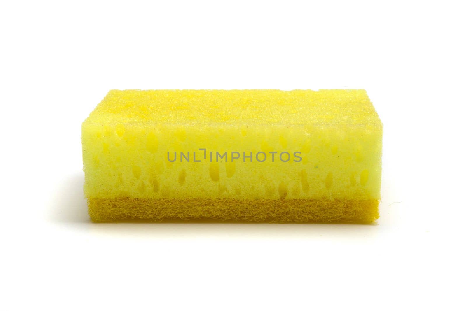 Single yellow sponge isolated on white background by clusterx