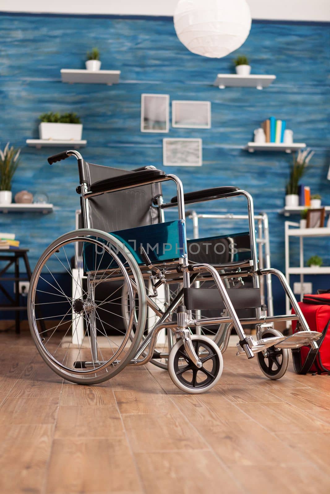 Wheelchair in nursing home room to aid mobility and recovery. Object designed to help people with physical disabilities to move from one space to another, friendly place for people with disability.