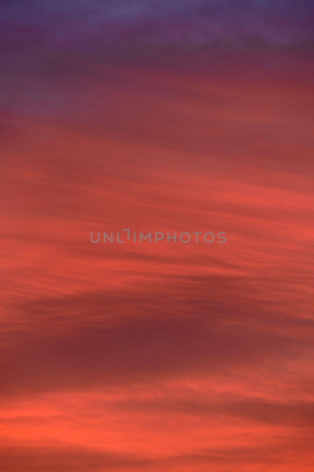 Sky light after sunset. orange background, clouds by raul_ruiz