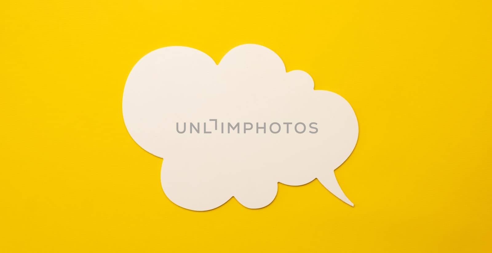 Thought white bubble isolated on yellow background with copyspace. Concept of idea, positive way of thinking and challenges. Brainstorm and process of creativity