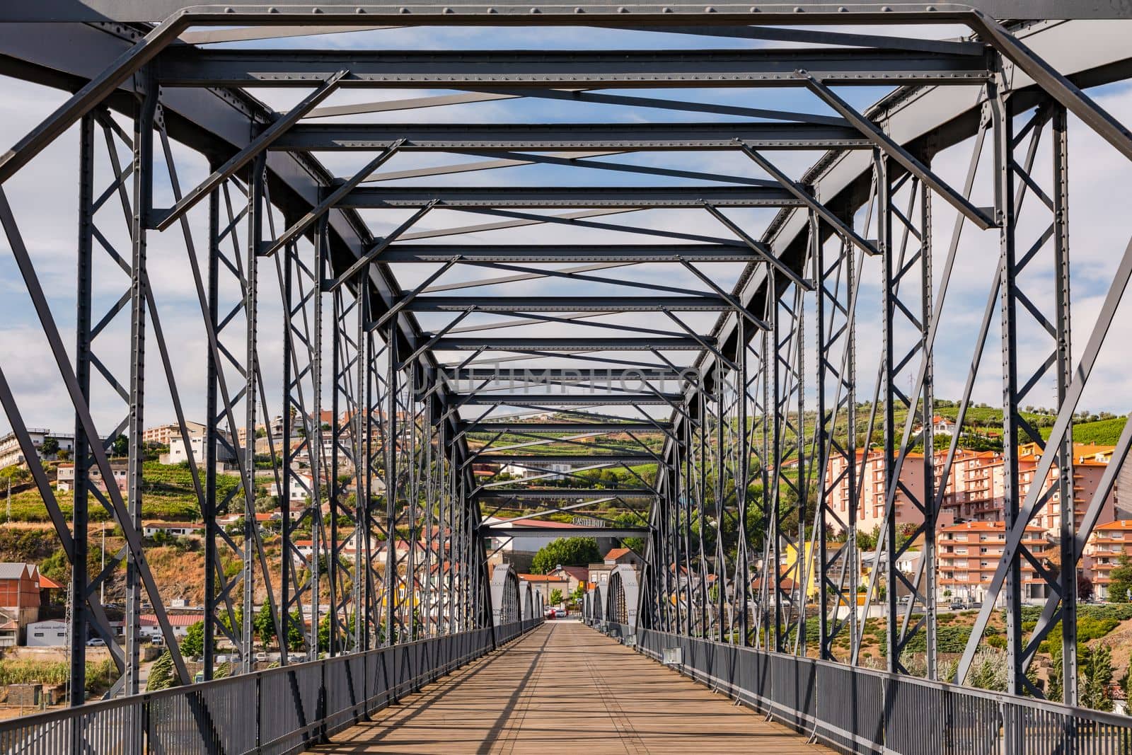 The steel bridge over the Douro River in Peso da Regua is for pedestrians only and offers beautiful views, Portugal