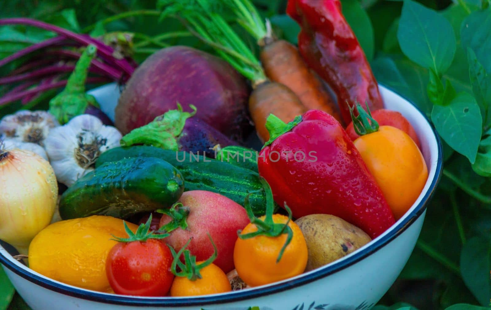 Child and vegetables. Selective focus feram