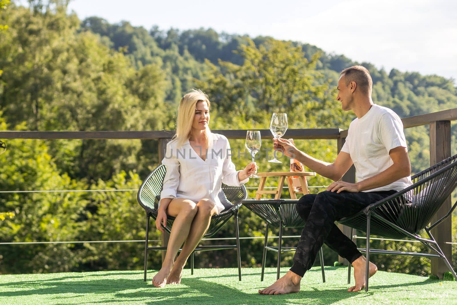 couple on the terrace in the mountains.