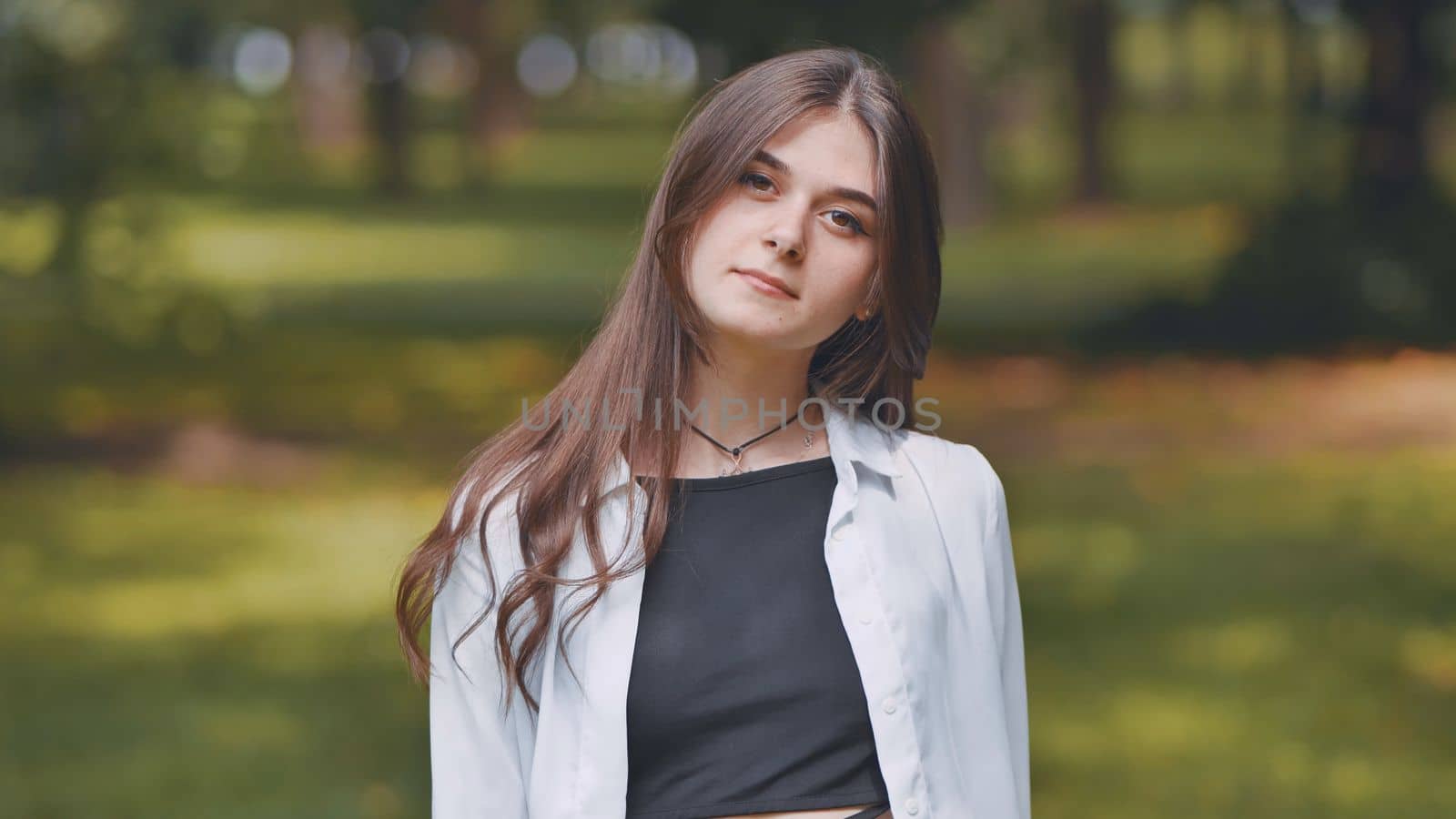 Portrait of a young Georgian girl in a park in summer