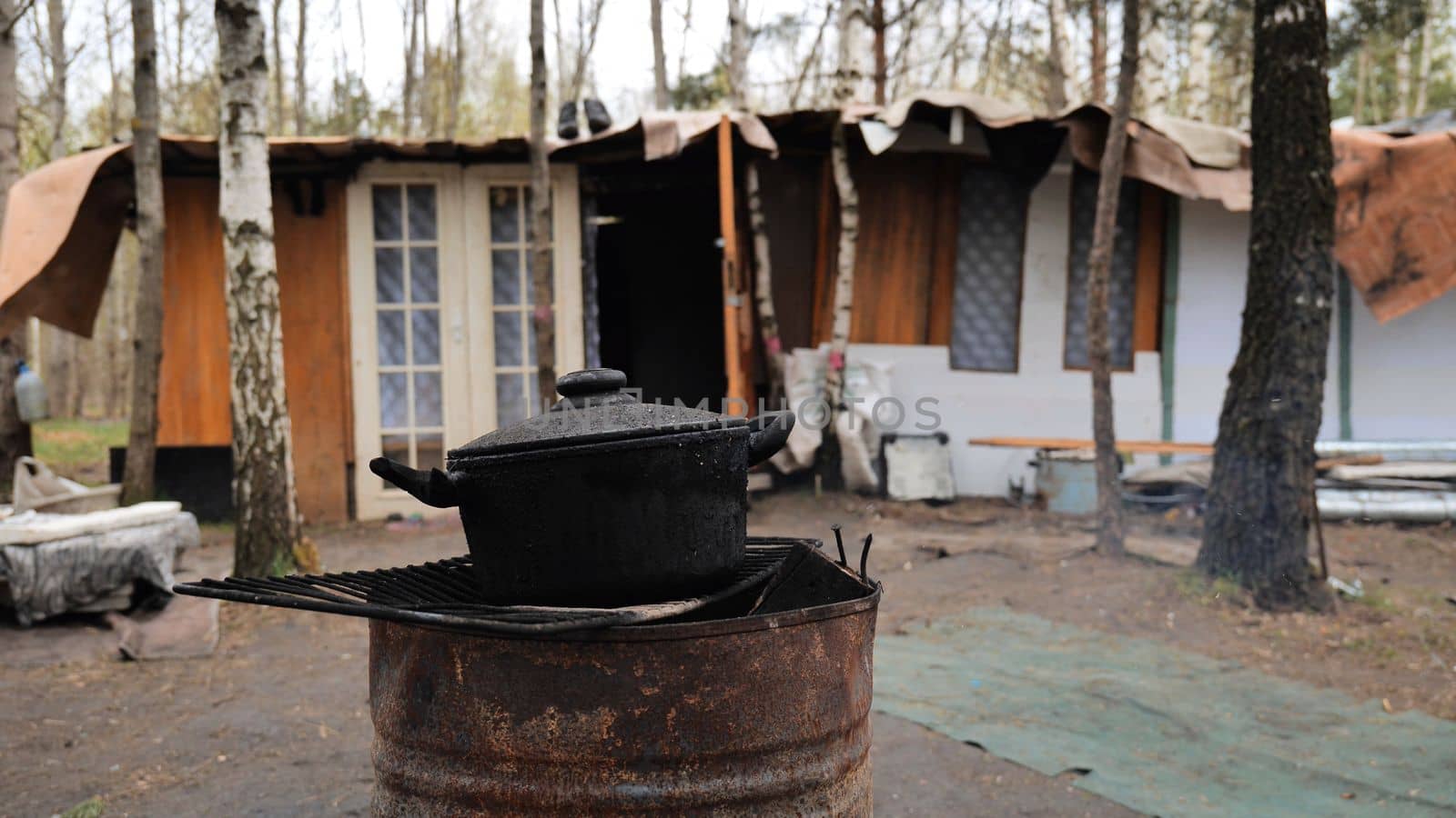 Beggars huts of homeless people near the landfill