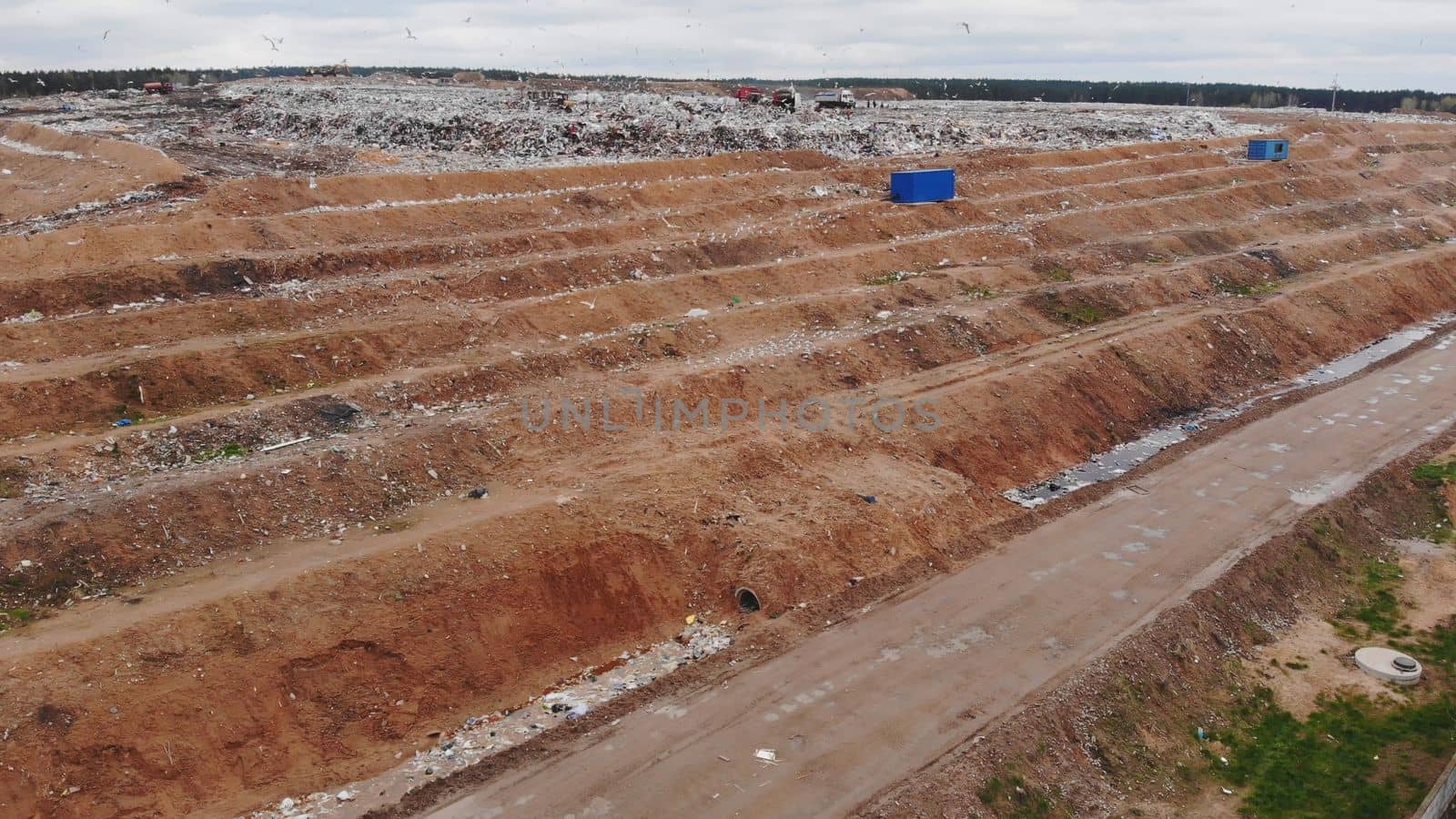 Large landfill near the metropolis. View from the drone