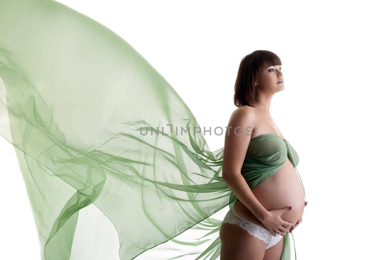 Beautiful pregnant woman with blowing fabric by rivertime