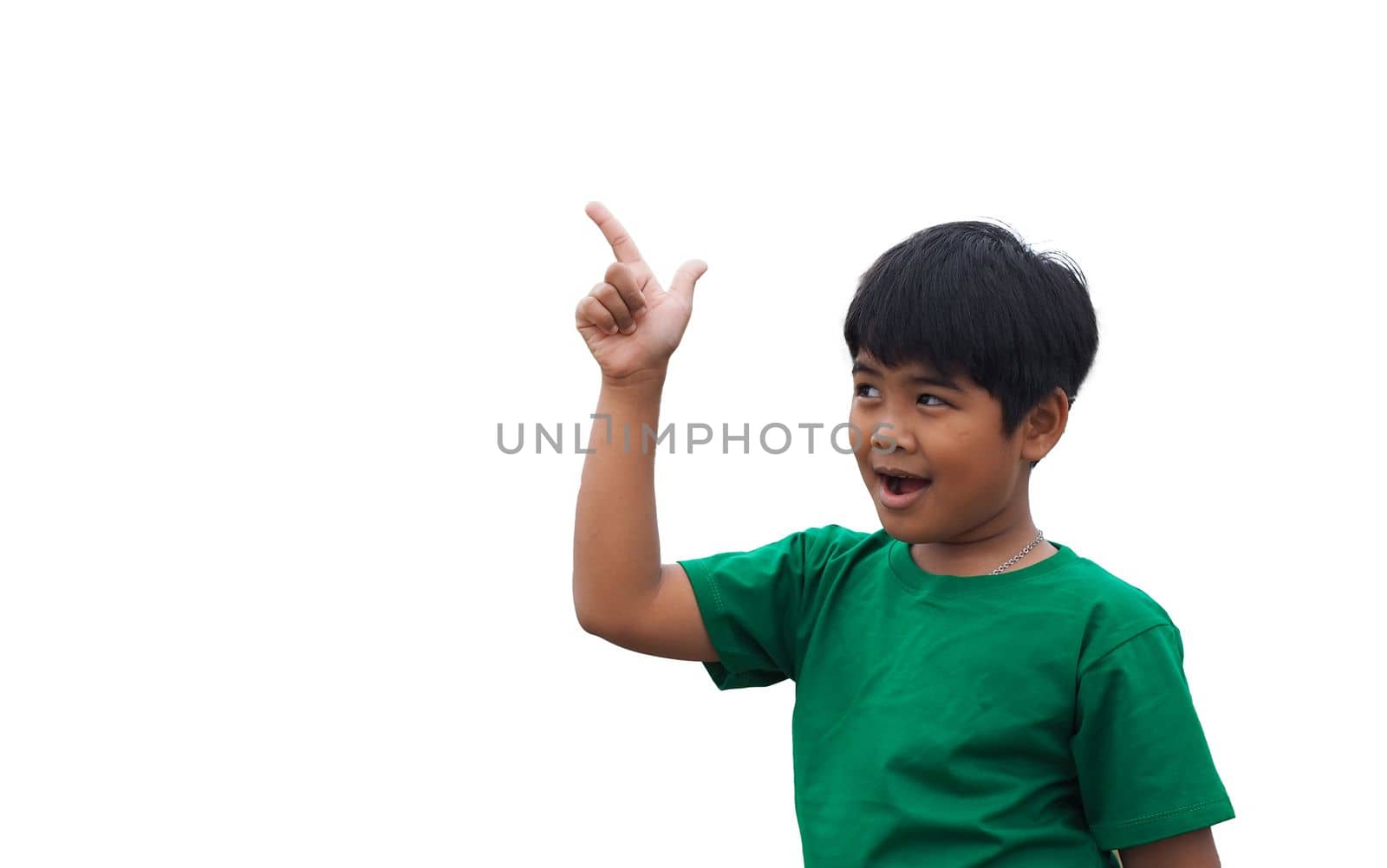 The boy smiled and pointed his hand to his side. on a white background