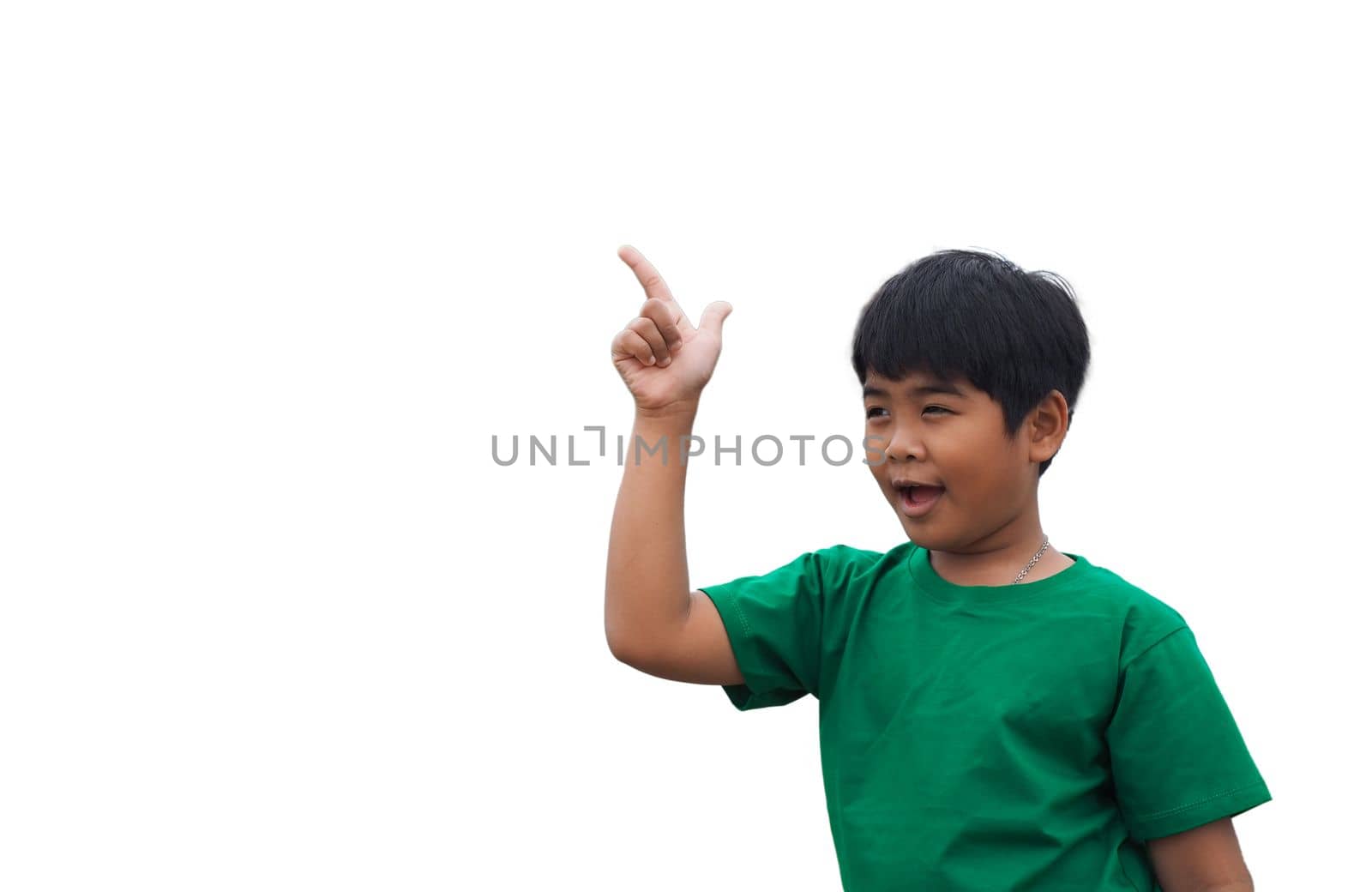 The boy smiled and pointed his hand to his side. on a white background