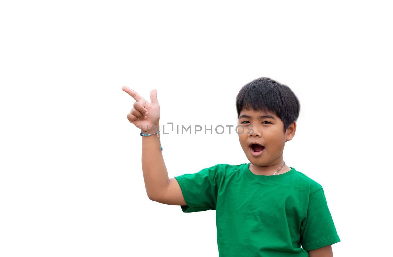 The boy smiled and pointed his hand to his side. on a white background