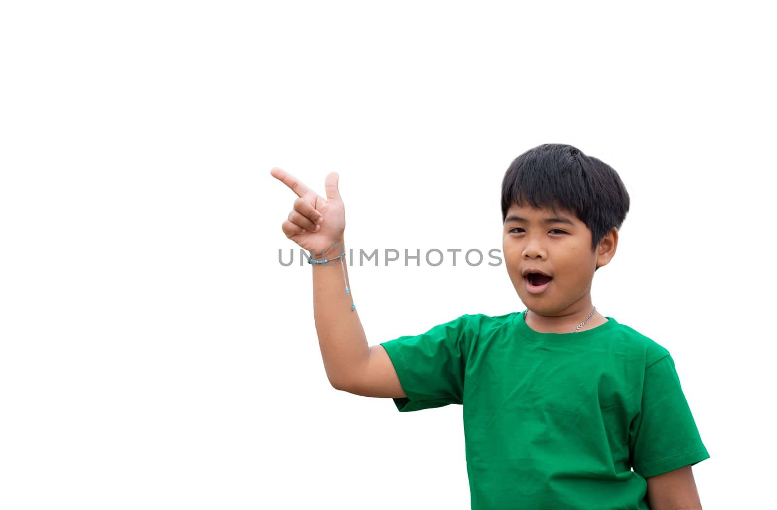 The boy smiled and pointed his hand to his side. on a white background