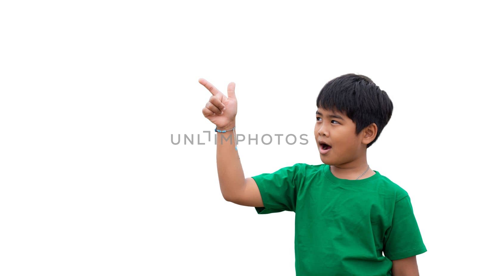 The boy smiled and pointed his hand to his side. on a white background