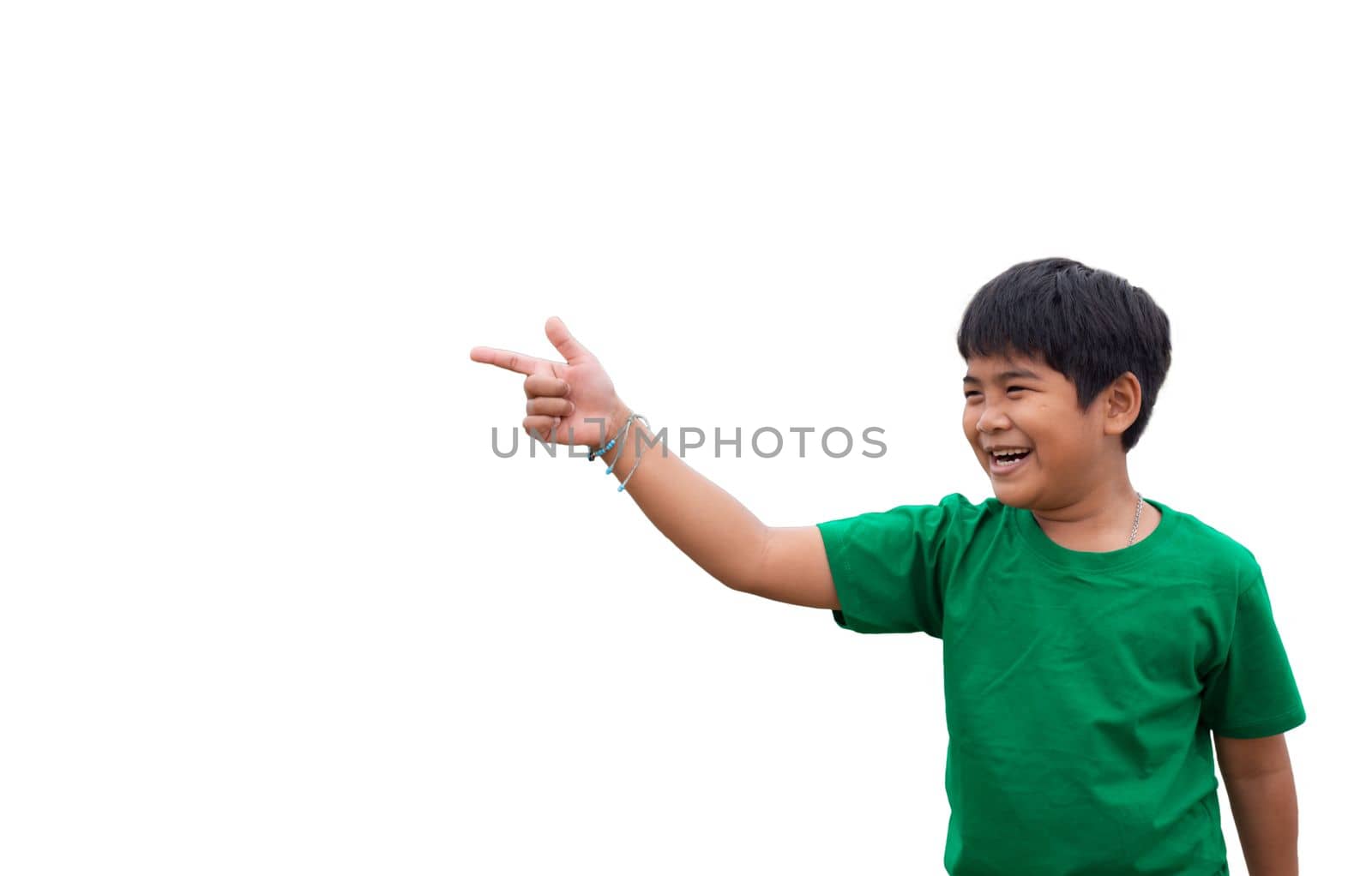 The boy smiled and pointed his hand to his side. on a white background