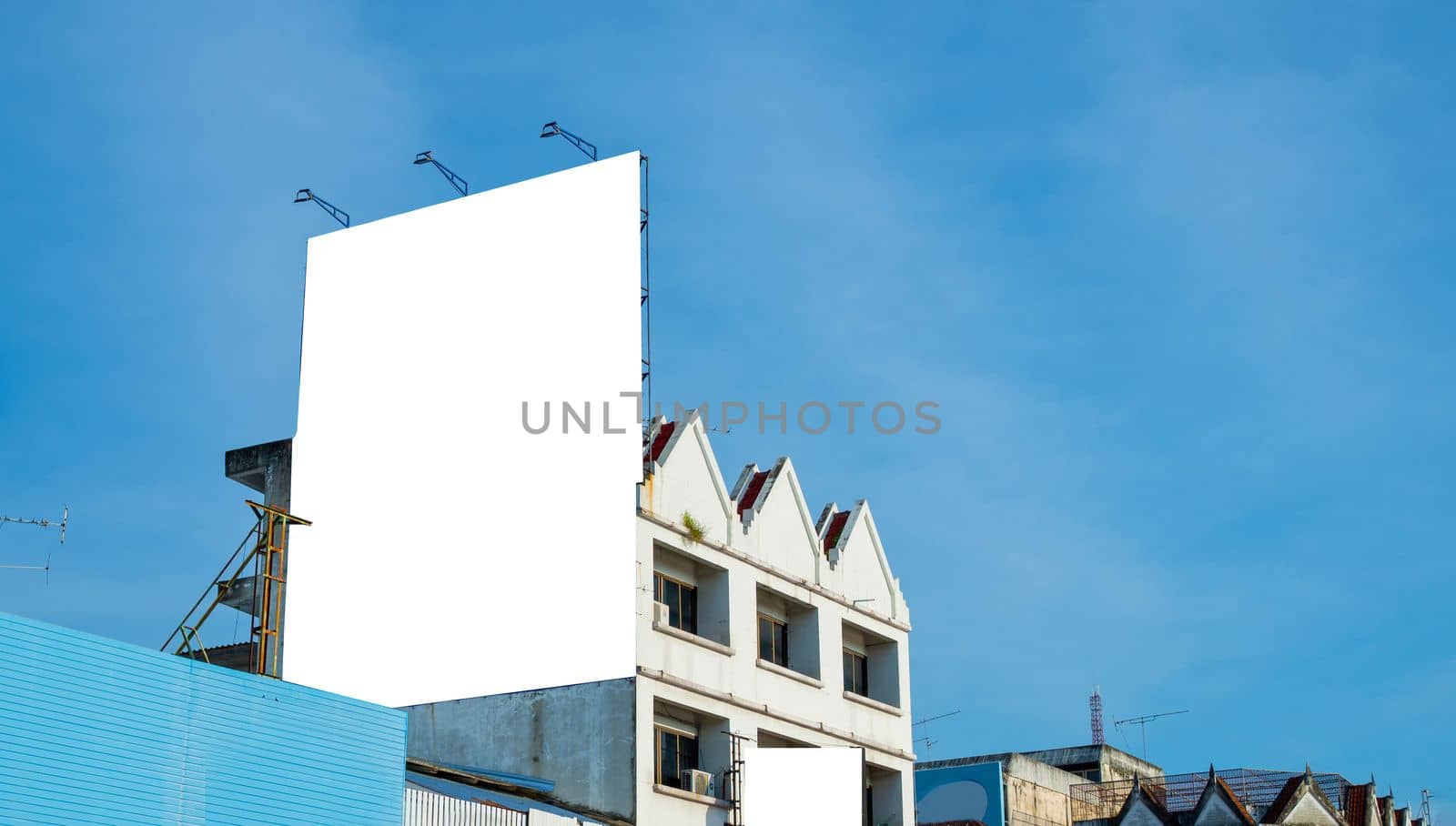 Blank billboard on the building. Useful for your advertisement.