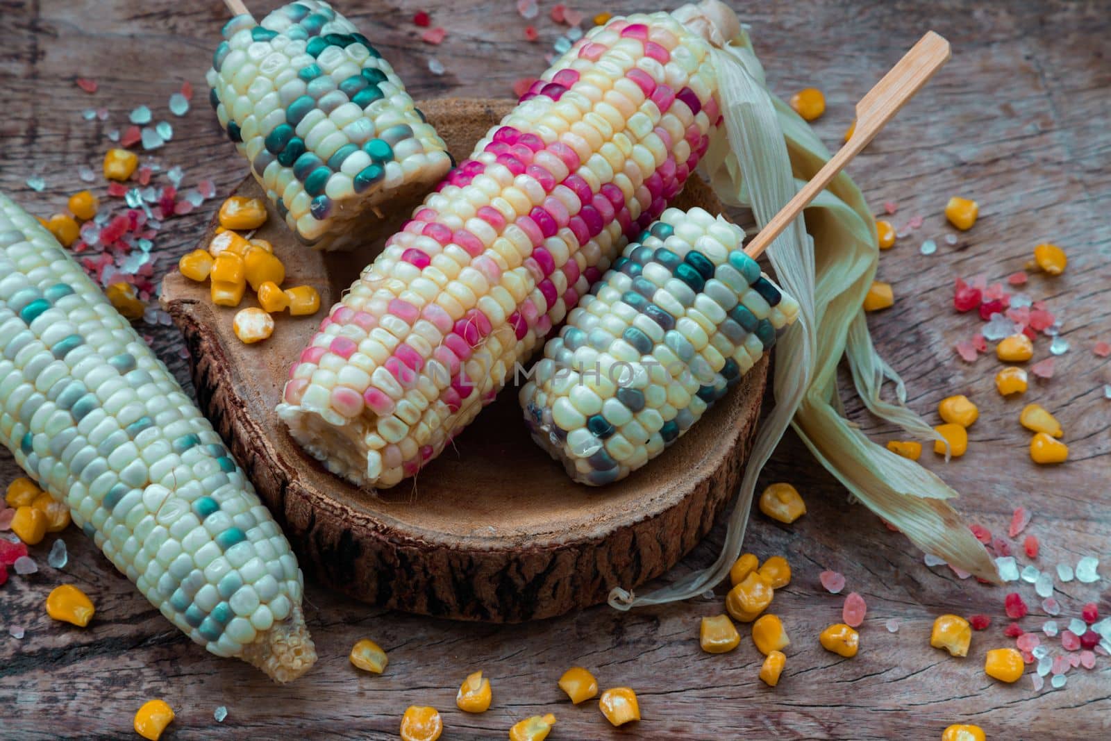 Fresh waxy corn or Sweet glutinous corn and Corn kernelson Rustic old wooden background.  by tosirikul