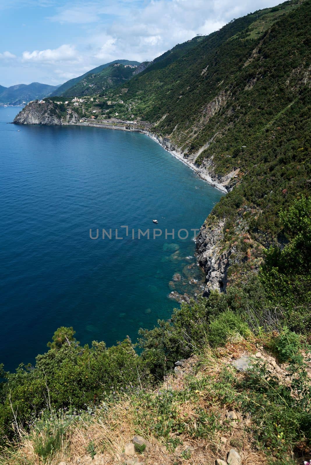 View of a section of the coast with one of the picturesque places in the Italian region of Cinque Terre.