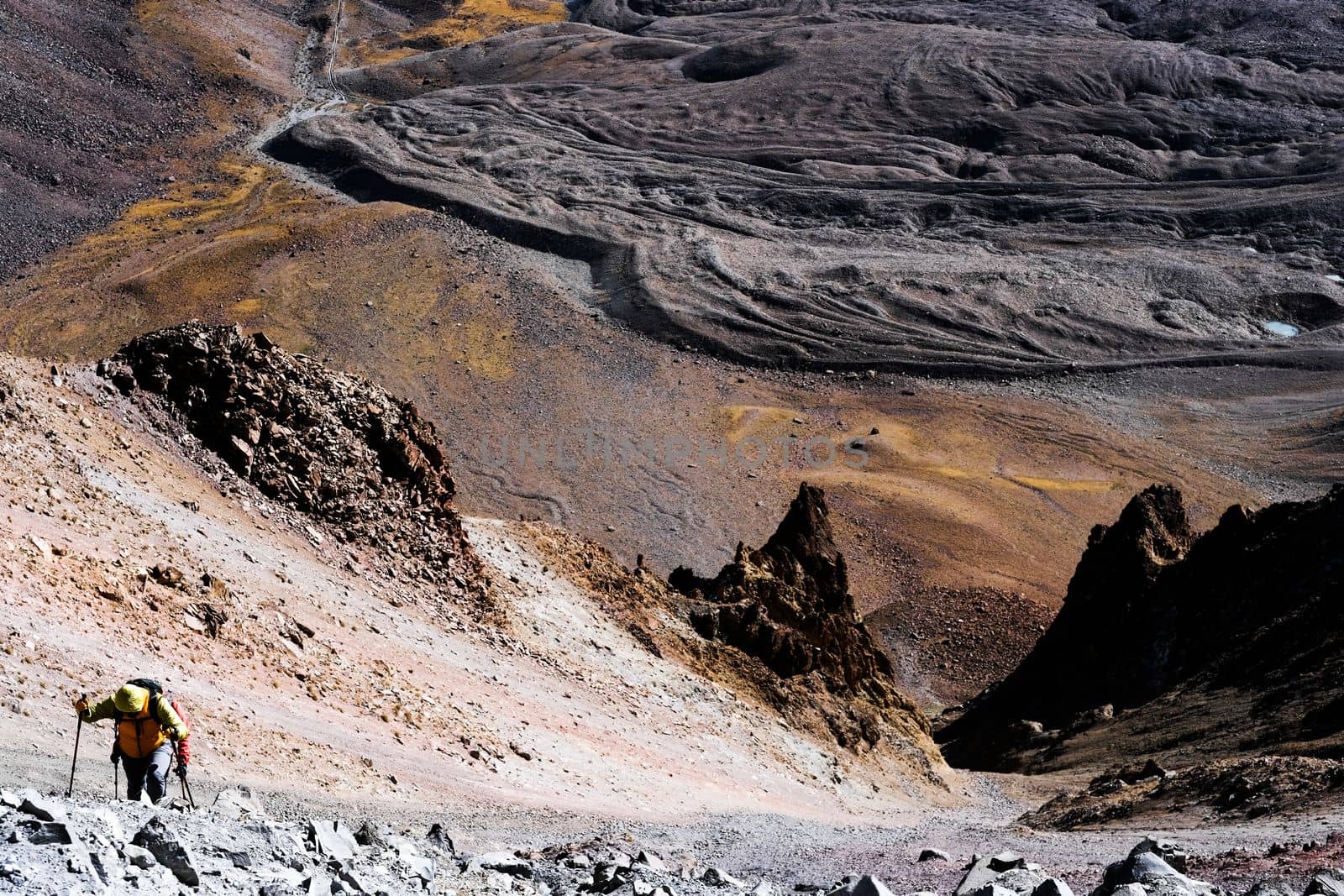 Tourists trekking on Erciac volcano in Turkey, view from top