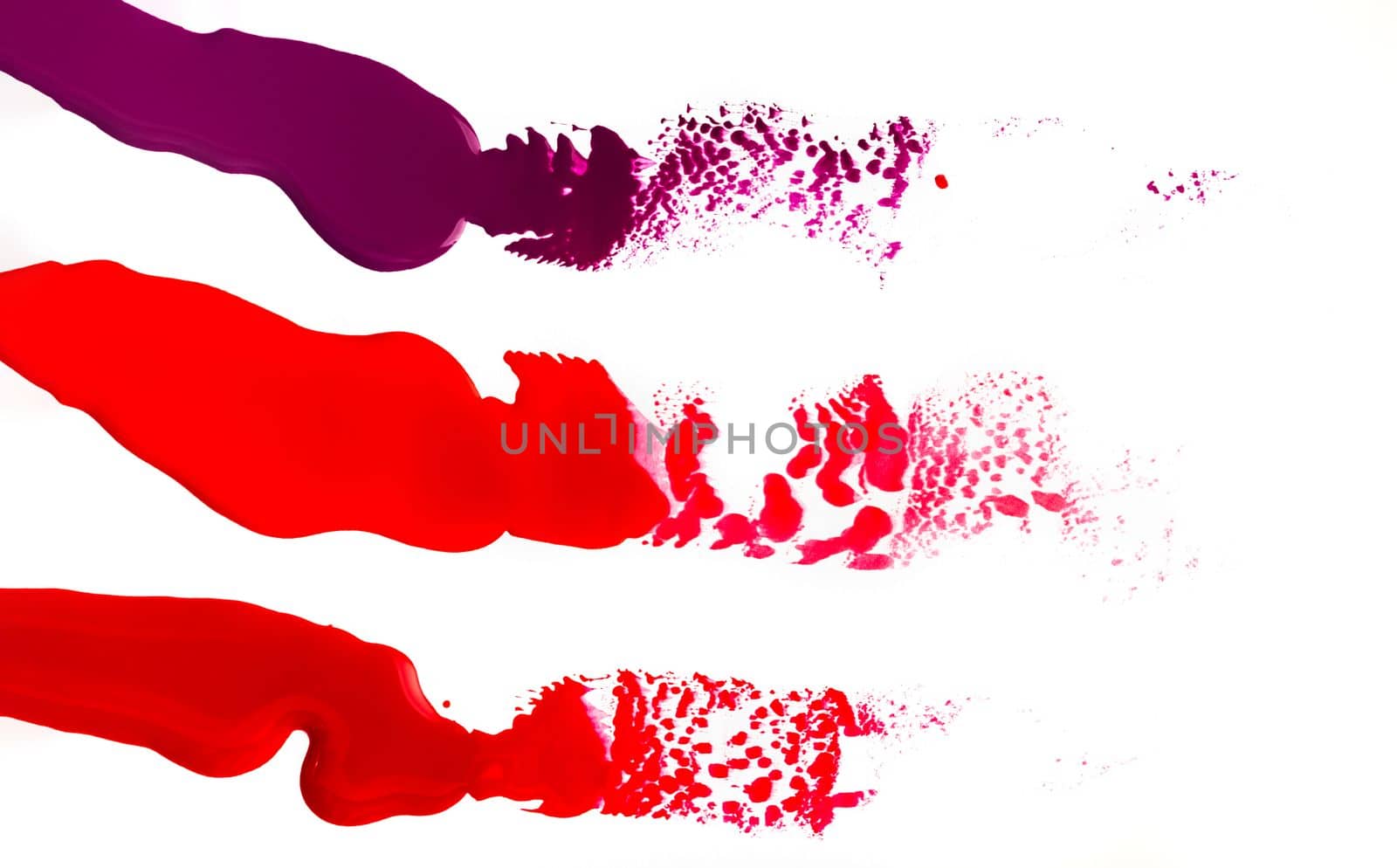 Bright spills of paint isolated on white background