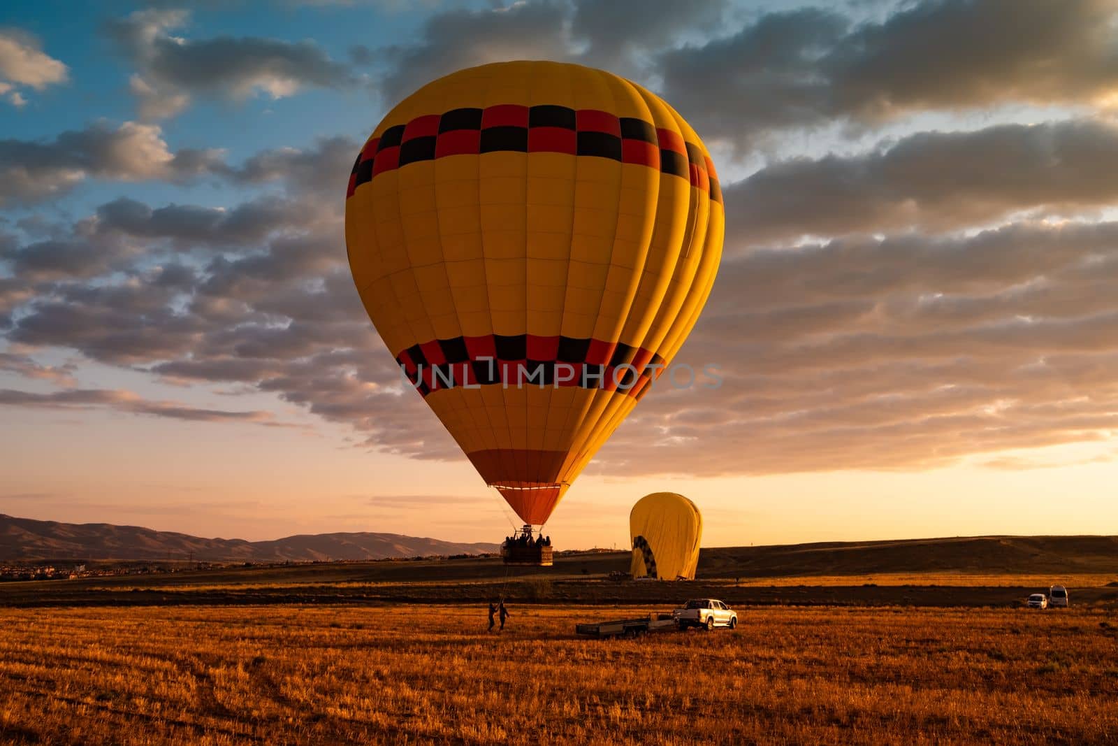 Hot air balloon festival ending at sunrise in Cappadocia, Turkey
