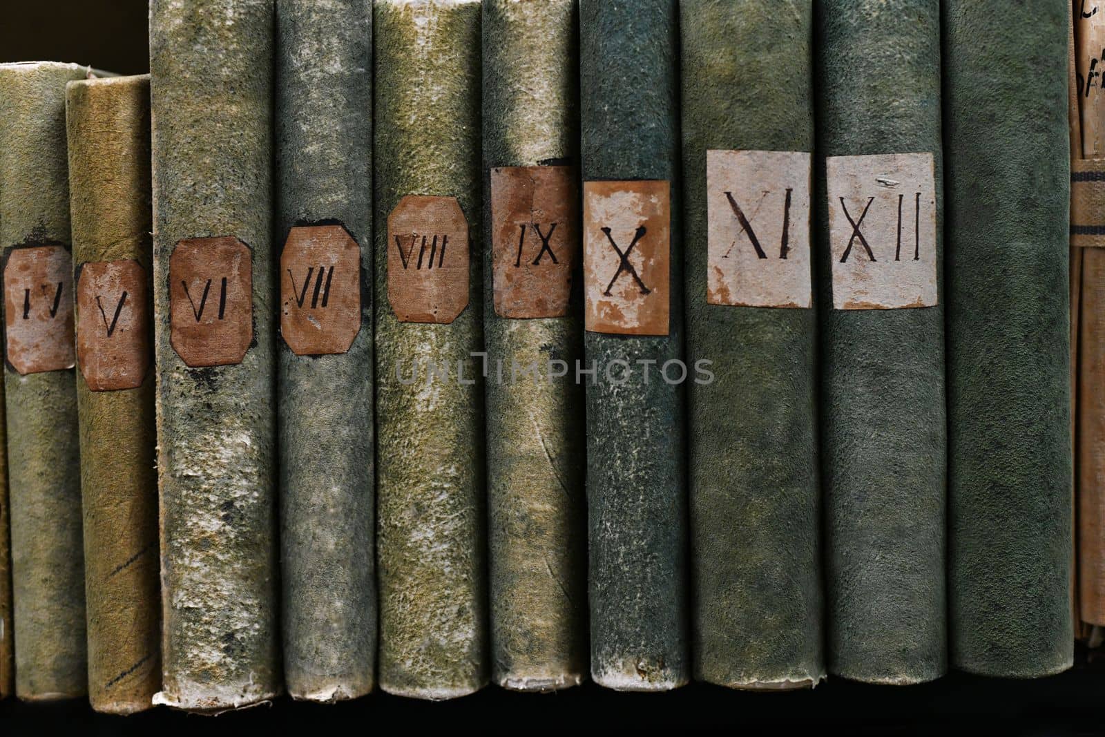Old books with Roman numerals in the library archive
