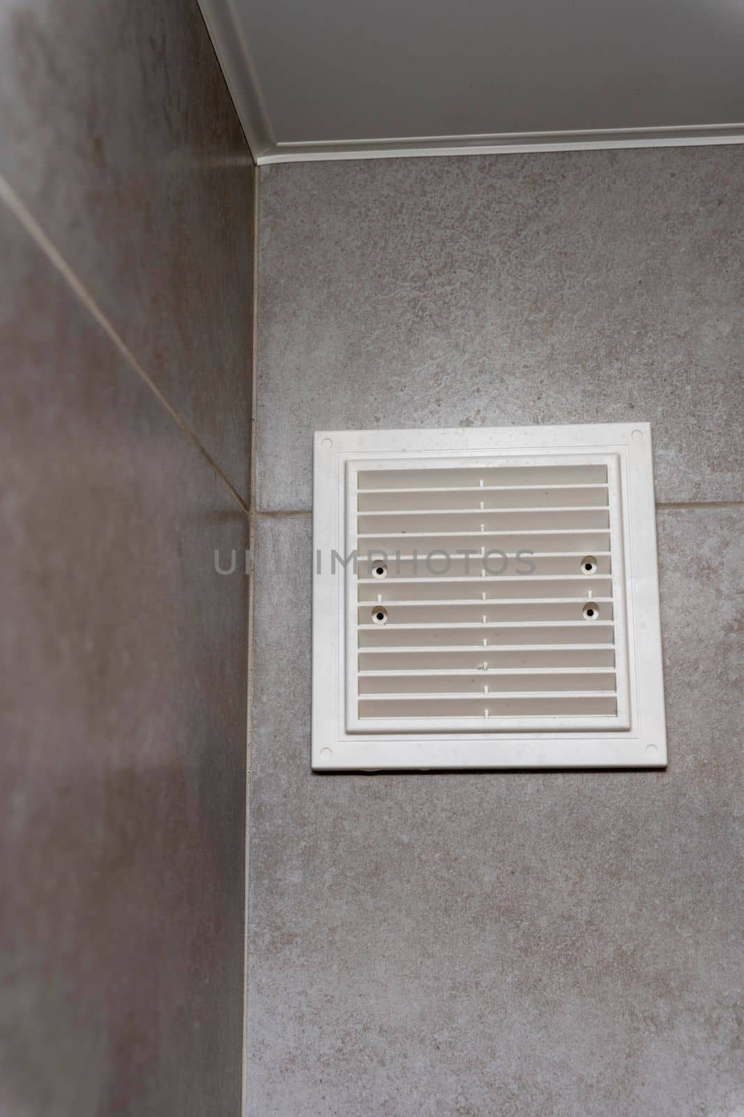 plastic white ventilation grille in the bathroom. Ventilation device by audiznam2609