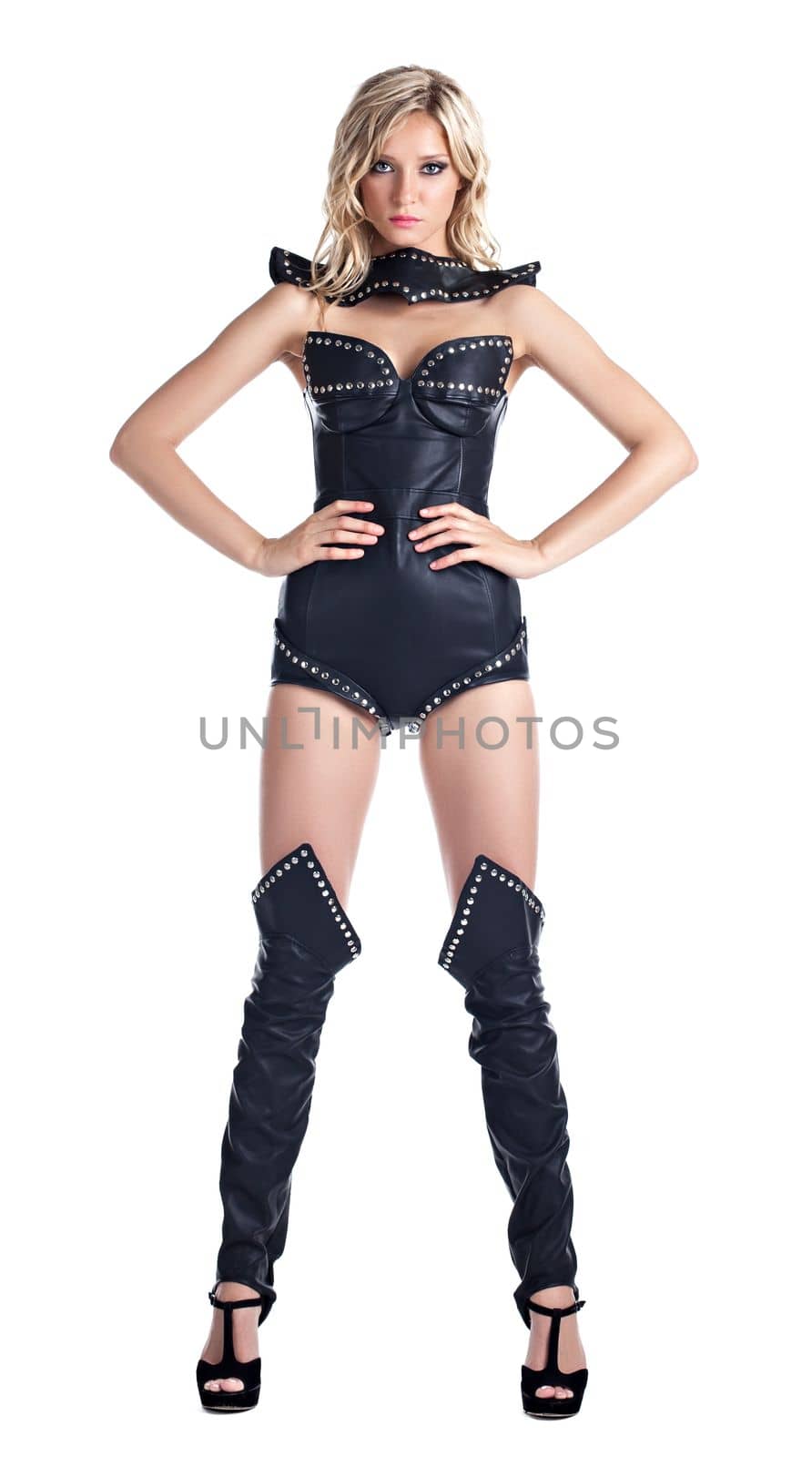 Sexy blond woman in leather corset stand isolated by rivertime