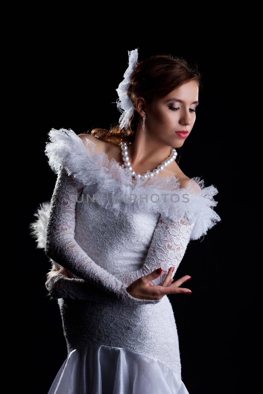 Young woman dance in white oriental flamenco costume