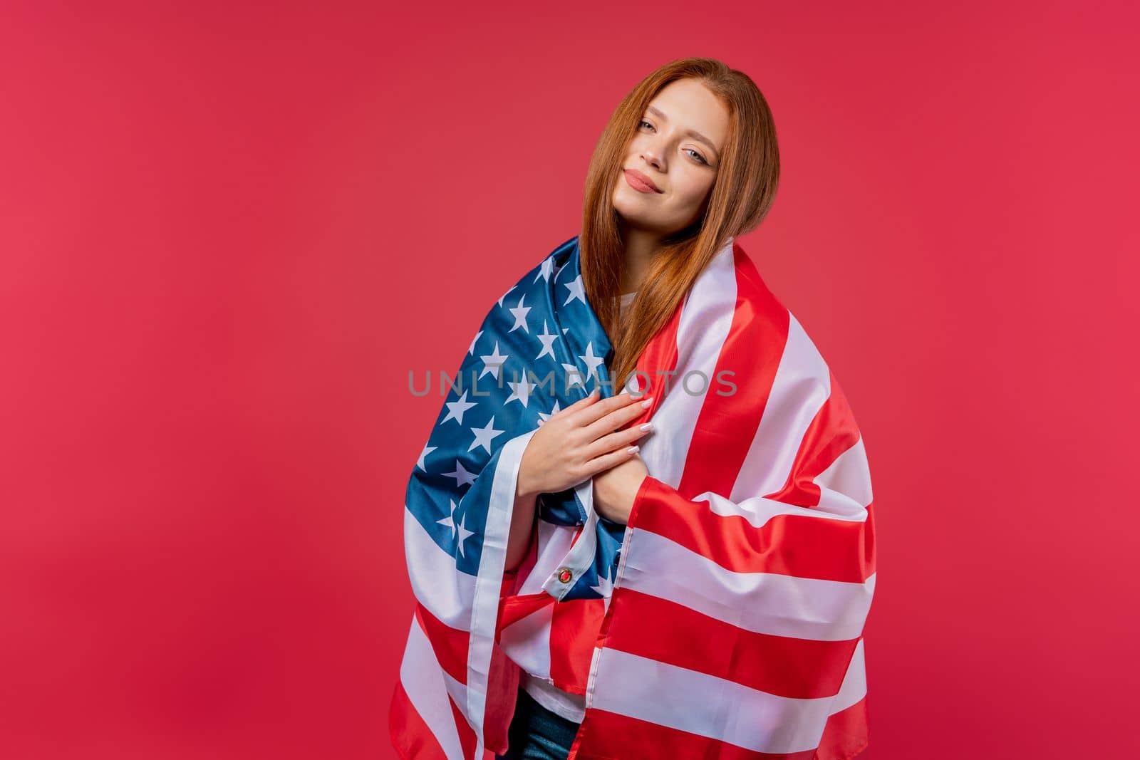 Smiling woman with national USA flag on pink background. American patriot, 4th of July - Independence day celebration, election, America, labor. US banner. by kristina_kokhanova