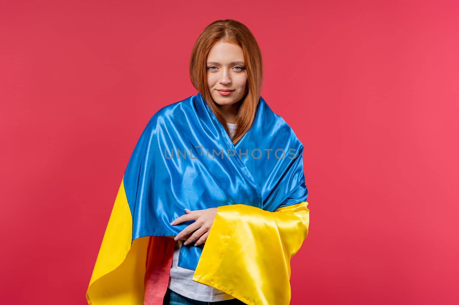 Happy woman with national Ukrainian flag on pink. Ukraine, patriot, victory in war celebration, banner, Independence day by kristina_kokhanova