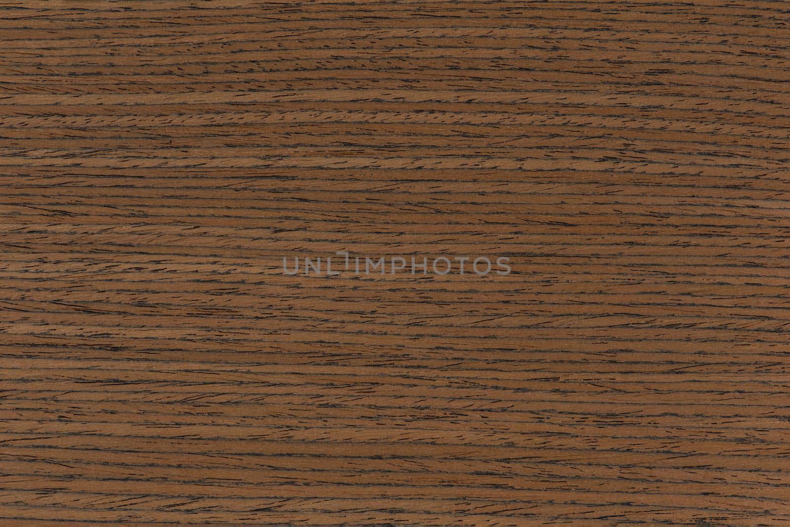 Texture of teak wood. Brown texture of natural teak wood. Wood for furniture, doors, terraces or floors