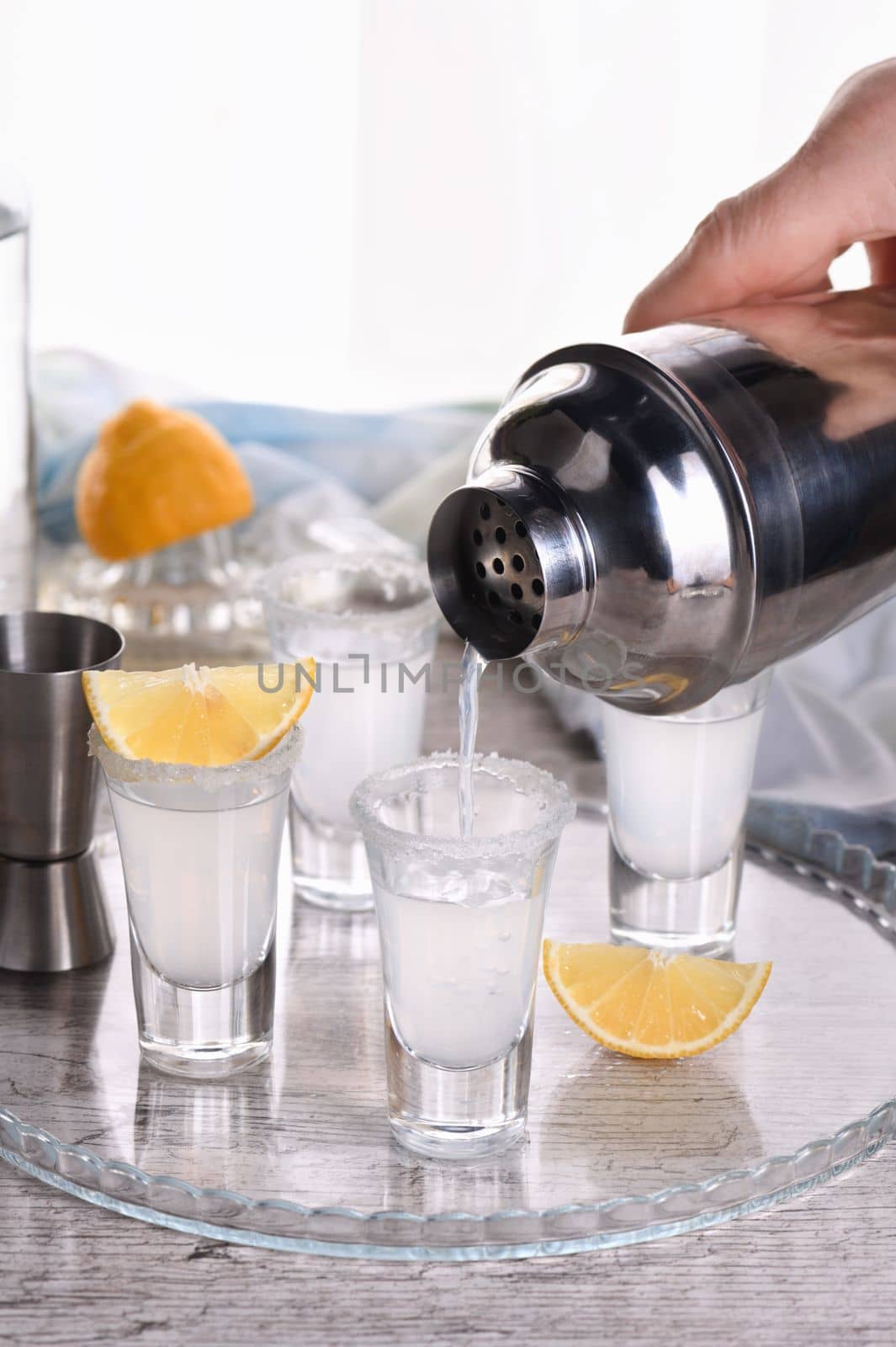 Shots vodka with lemon by Apolonia