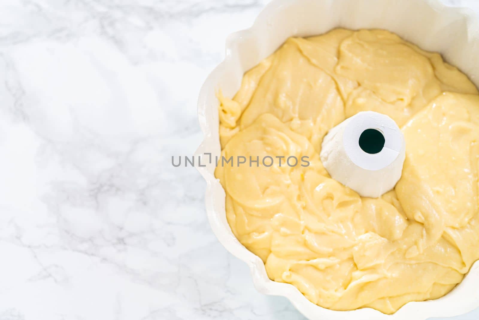 Cake batter in bundt cake pan ready for baking.
