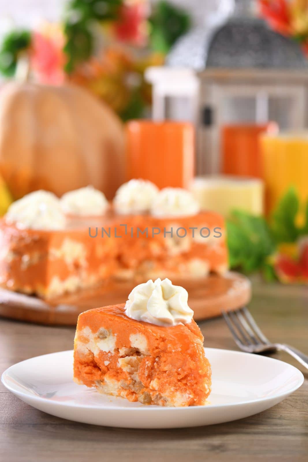 Slice of Pumpkin and cottage cheese casserole on a plate. This is a delicious dessert filled with autumnal notes. It is full of pumpkin spice aromas, creamy softness with raisins.