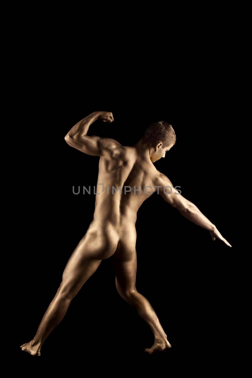 Naked strong man posing like metal skin statue by rivertime
