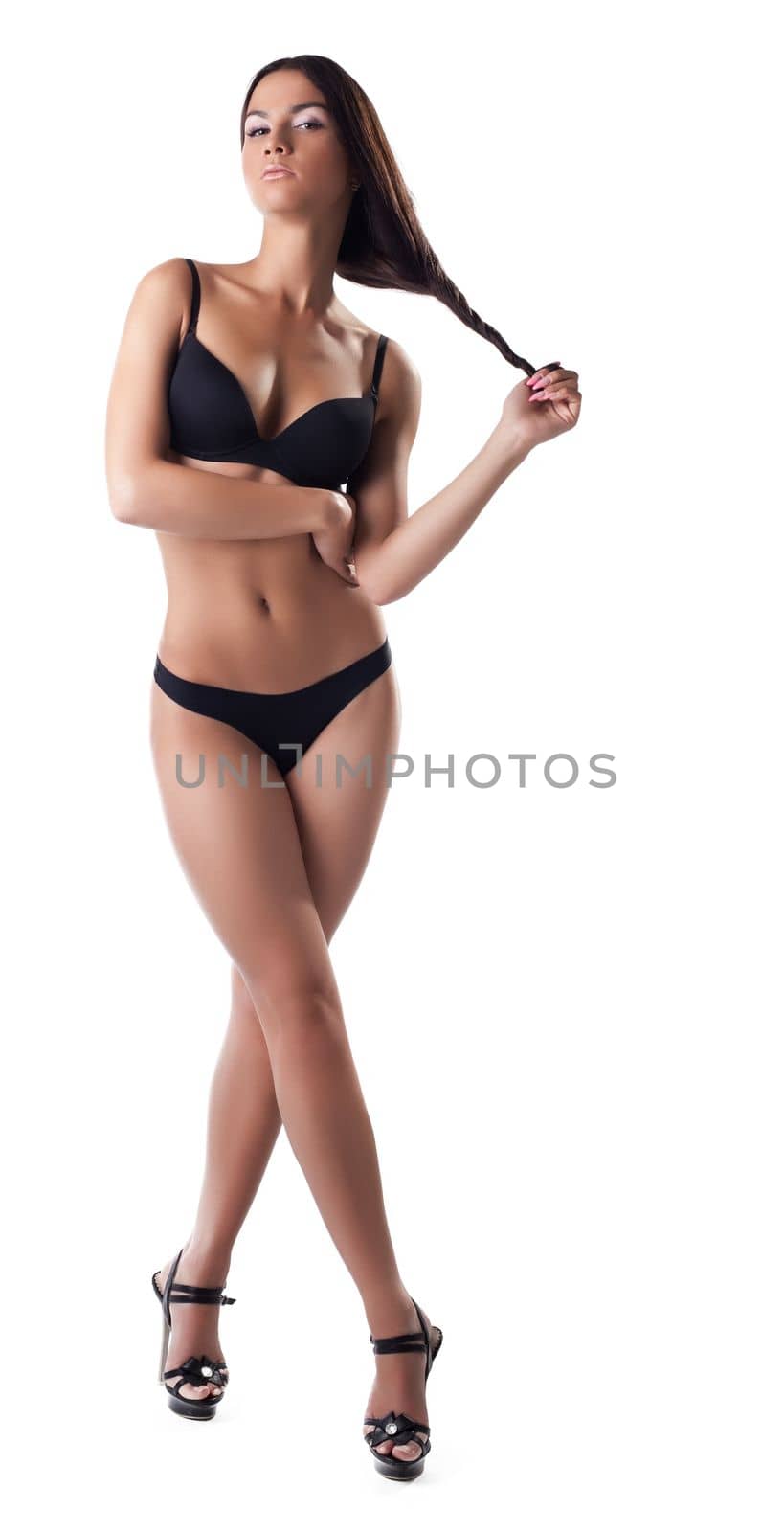 amazing young brunette woman posing in sexy black lingerie with long hairs