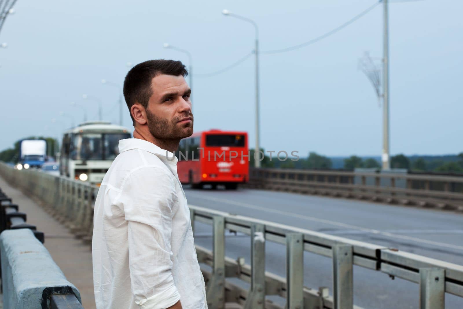 tired sad man portrait look at street outdoor