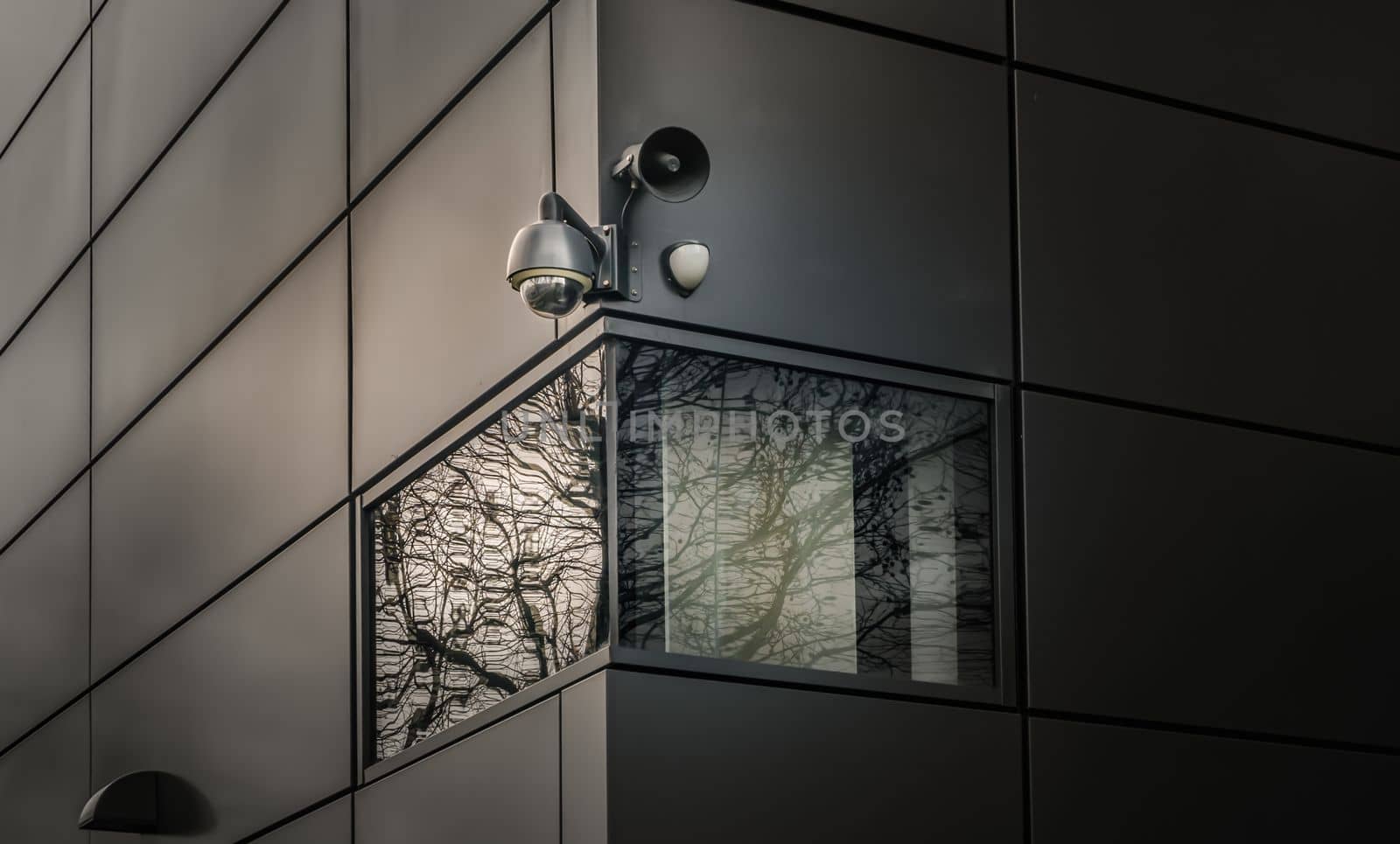 Surveillance camera for mounted on outside wall of Modern building. The concept of surveillance and visual inspection that has been developed, Selective focus.